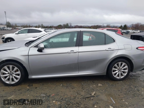 2020 Toyota Camry LE with VIN 4T1C11AK5LU869525, listed as a IAAI auction lot 41693706 with 134,201 mi miles. Bid and sale history available at carsss.com. Image 14.