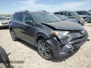 2017 Toyota RAV4 LE with VIN 2T3BFREV4HW592199, listed as a Copart auction lot 58538915 with 137,964 mi miles and Salvage title. Bid and sale history available at DreamBid. Image 4.