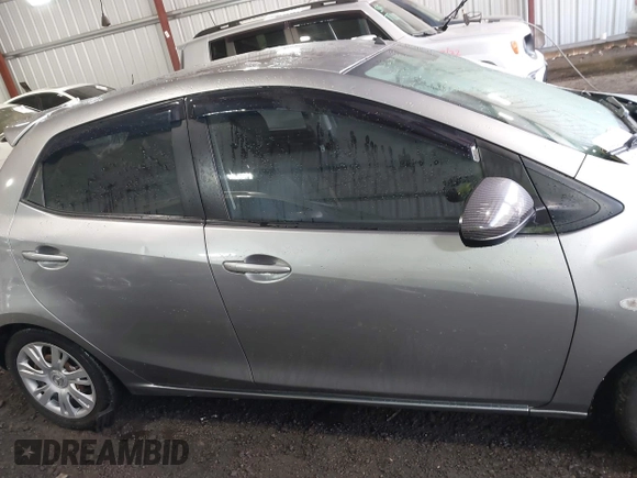 2013 Mazda 2 Sport with VIN JM1DE1KY1D0167999, listed as a IAAI auction lot 41713546 with 204,443 mi miles and . Bid and sale history available at DreamBid. Image 13.