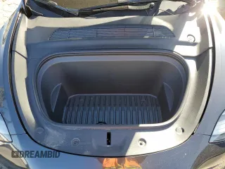 2024 Tesla Model Y Long Range z VIN 7SAYGAEE2RF009616, wystawiony jako Copart lot #46139805 z przebiegiem 6 535 mil mil oraz Szkoda całkowita • Salvage title. Historia ofert i sprzedaży dostępna na DreamBid. Obrazek 12.
