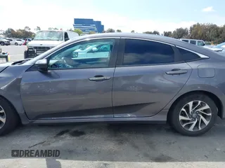 2016 Honda Civic Sedan EX with VIN 2HGFC2F7XGH526418, listed as a IAAI auction lot 41890264 with 124,620 mi miles. Bid and sale history available at carsss.com. Image 14.