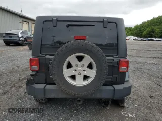 2012 Jeep Wrangler Unlimited Sport z VIN 1C4BJWDG9CL102626, wystawiony jako Copart lot #58421455 z przebiegiem 128 421 mil mil oraz Szkoda całkowita • Salvage title. Historia ofert i sprzedaży dostępna na DreamBid. Obrazek 6.