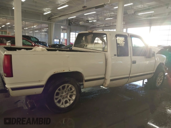 1993 GMC Sierra 1500 z VIN 2GTEK19K1P1564491, wystawiony jako IAAI lot #41347909 z przebiegiem 342 325 mil mil oraz . Historia ofert i sprzedaży dostępna na DreamBid. Obrazek 14.