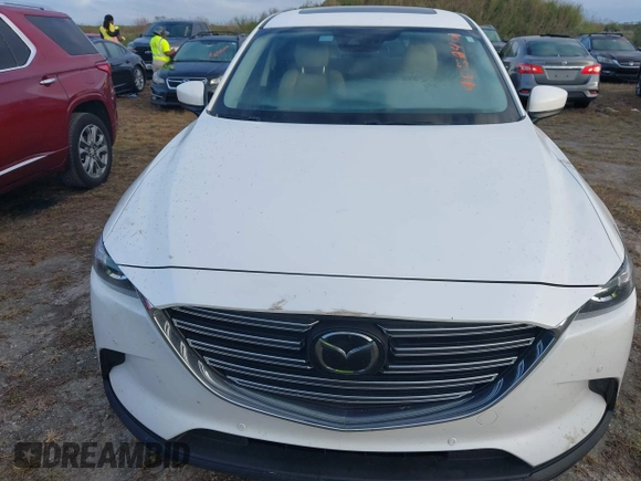 2021 Mazda CX-9 Touring with VIN JM3TCACY3M0505376, listed as a IAAI auction lot 40524326 with 1 mi miles. Bid and sale history available at carsss.com. Image 12.