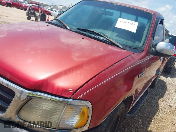 2001 Ford F-150 XL with VIN 2FTZF07251CA53817, listed as a IAAI auction lot 42661123 with Not provided miles and . Bid and sale history available at DreamBid. Image 2.