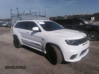 2020 Jeep Grand Cherokee Trackhawk with VIN 1C4RJFN94LC117596, listed as a IAAI auction lot 36356989 with 37,994 mi miles and . Bid and sale history available at DreamBid. Image 1.