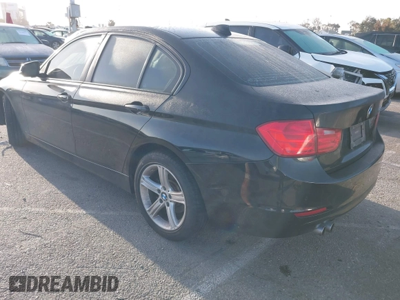 2015 BMW 3 Series 328i with VIN WBA3C1C55FK119562, listed as a IAAI auction lot 41945606 with 51,922 mi miles and . Bid and sale history available at DreamBid. Image 3.