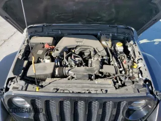 2021 Jeep Wrangler Unlimited Sport S with VIN 1C4HJXDG4MW699376, listed as a Copart auction lot 47202615 with 57,192 mi miles and Salvage Title. Bid and sale history available at DreamBid. Image 12.