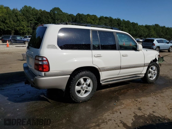 2004 Toyota Land Cruiser with VIN JTEHT05J542066724, listed as a Copart auction lot 74888234 with 244,845 mi miles and Salvage Title. Bid and sale history available at carsss.com. Image 3.