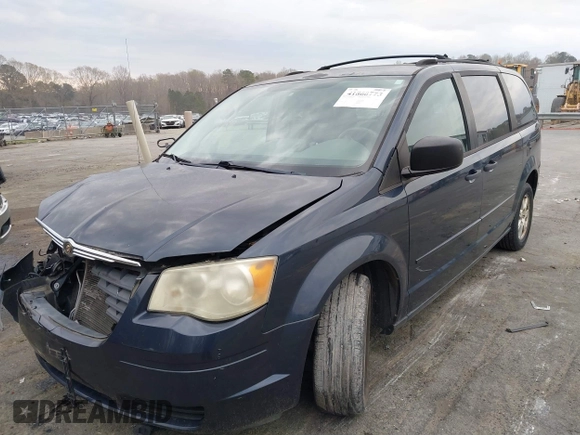 2008 Chrysler Town & Country LX with VIN 2A8HR44H28R114978, listed as a IAAI auction lot 41860775 with 179,828 mi miles. Bid and sale history available at carsss.com. Image 2.