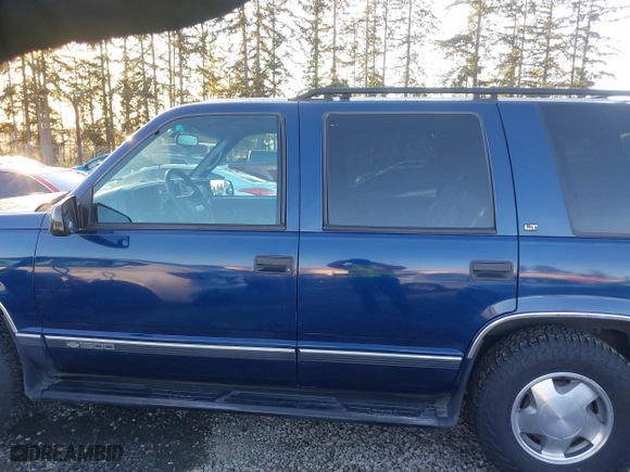 1997 Chevrolet Tahoe with VIN 1GNEK13R4VJ418974, listed as a IAAI auction lot 41560411 with 198,170 mi miles. Bid and sale history available at carsss.com. Image 14.