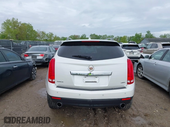 2014 Cadillac SRX Performance Collection with VIN 3GYFNCE34ES519059, listed as a IAAI auction lot 42237351 with 80,578 mi miles and . Bid and sale history available at DreamBid. Image 17.