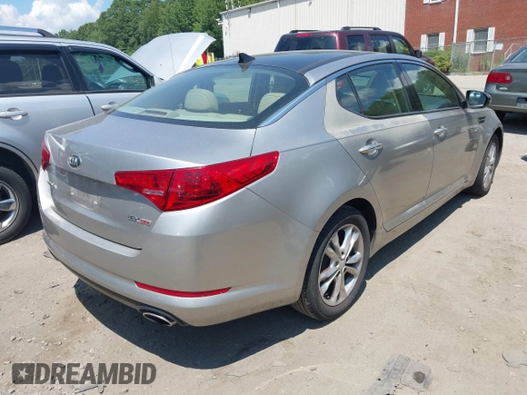 2013 Kia Optima EX with VIN 5XXGN4A79DG133492, listed as a IAAI auction lot 42742932 with 85,179 mi miles and . Bid and sale history available at DreamBid. Image 4.