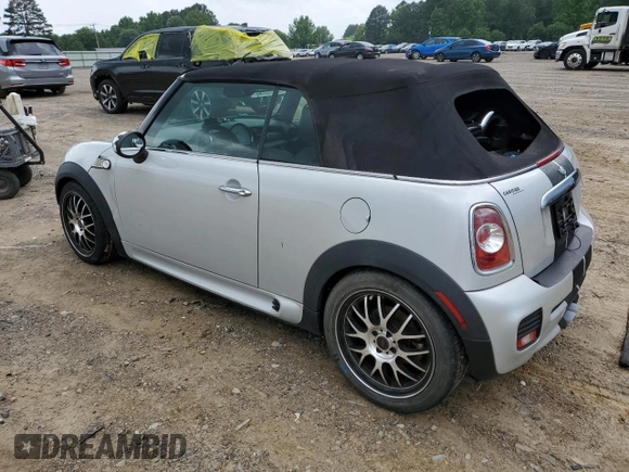 2011 MINI Convertible S z VIN WMWZP3C51BTX84117, wystawiony jako Copart lot #57636385 z przebiegiem 130 700 mil mil oraz Szkoda całkowita • Salvage title. Historia ofert i sprzedaży dostępna na DreamBid. Obrazek 2.