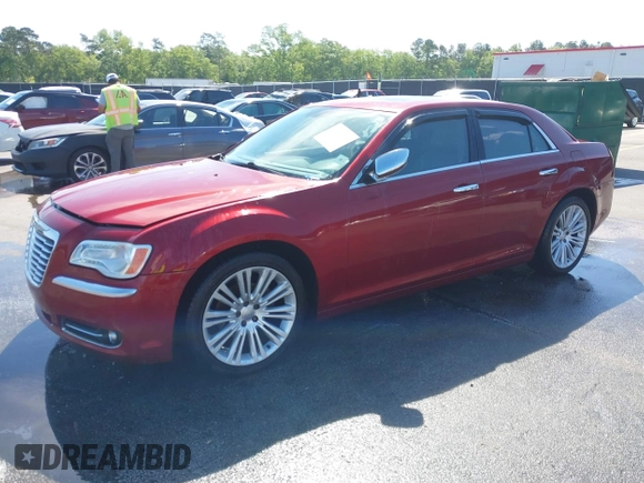 2012 Chrysler 300 Limited with VIN 2C3CCACG5CH165341, listed as a IAAI auction lot 42036190 with 184,536 mi miles. Bid and sale history available at carsss.com. Image 2.