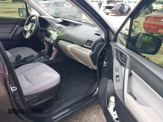2018 Subaru Forester Premium with VIN JF2SJAGC0JH452501, listed as a IAAI auction lot 41871403 with 65,412 mi miles. Bid and sale history available at carsss.com. Image 5.