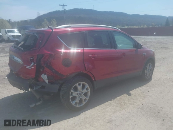 2015 Ford Escape Titanium with VIN 1FMCU9JX9FUB87463, listed as a IAAI auction lot 42059618 with 32,100 mi miles. Bid and sale history available at carsss.com. Image 4.