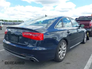 2013 Audi A6 Prestige z VIN WAUJGAFC6DN005023, wystawiony jako IAAI lot #42201985 z przebiegiem 80 337 mil mil oraz . Historia ofert i sprzedaży dostępna na DreamBid. Obrazek 4.