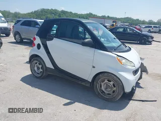2009 Smart fortwo Pure with VIN WMEEJ31XX9K302737, listed as a IAAI auction lot 42124550 with 43,610 mi miles and . Bid and sale history available at DreamBid. Image 1.