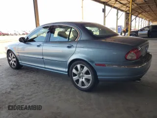 2004 Jaguar X-Type with VIN SAJEA51C14WE06627, listed as a Copart auction lot 54925735 with 107,756 mi miles and Clean Title. Bid and sale history available at DreamBid. Image 2.