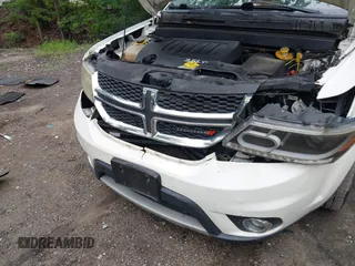 2015 Dodge Journey SXT with VIN 3C4PDCCG2FT690956, listed as a IAAI auction lot 42515701 with 145,676 mi miles and . Bid and sale history available at DreamBid. Image 6.