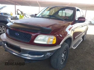 1998 Ford F-150 with VIN 1FTZX18WXWNC06973, listed as a IAAI auction lot 42442733 with 196,754 mi miles and . Bid and sale history available at DreamBid. Image 2.