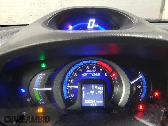 2010 Honda Insight LX with VIN JHMZE2H52AS034613, listed as a Copart auction lot 52701795 with 232,541 mi miles and Salvage Title. Bid and sale history available at DreamBid. Image 9.