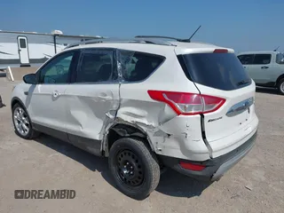 2015 Ford Escape Titanium with VIN 1FMCU0JX4FUB07322, listed as a IAAI auction lot 42220345 with 184,852 mi miles and . Bid and sale history available at DreamBid. Image 6.