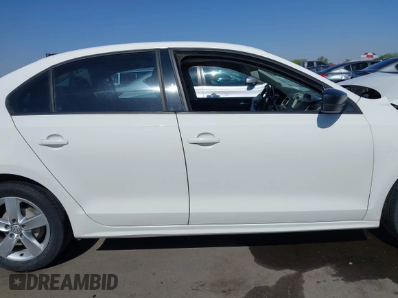 2012 Volkswagen Jetta S z VIN 3VW1K7AJ2CM331367, wystawiony jako IAAI lot #42294252 z przebiegiem 162 373 mil mil oraz . Historia ofert i sprzedaży dostępna na DreamBid. Obrazek 14.