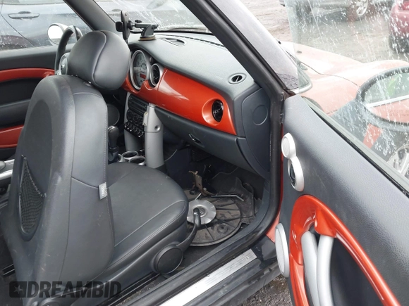 2006 MINI Convertible with VIN WMWRF33566TG14606, listed as a IAAI auction lot 41402790 with 177,081 mi miles and . Bid and sale history available at DreamBid. Image 5.