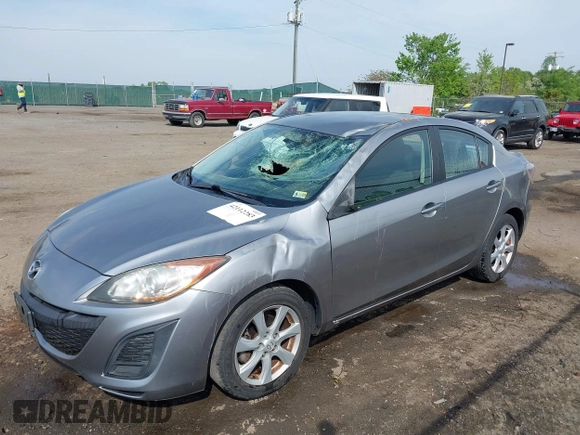 2011 Mazda Mazda3 i Touring with VIN JM1BL1VGXB1372499, listed as a IAAI auction lot 42112283 with 98,564 mi miles. Bid and sale history available at carsss.com. Image 2.