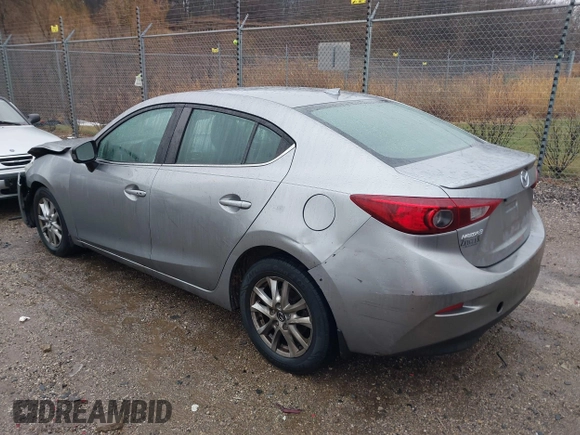 2016 Mazda 3 i Grand Touring z VIN 3MZBM1X74GM245295, wystawiony jako IAAI lot #41079843 z przebiegiem 183 480 mil mil oraz . Historia ofert i sprzedaży dostępna na DreamBid. Obrazek 3.