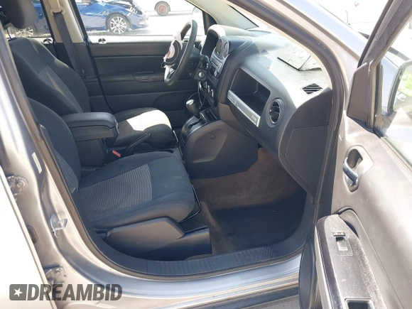 2017 Jeep Compass Sport with VIN 1C4NJCBA5HD147977, listed as a IAAI auction lot 41821444 with 86,126 mi miles and . Bid and sale history available at carsss.com. Image 5.