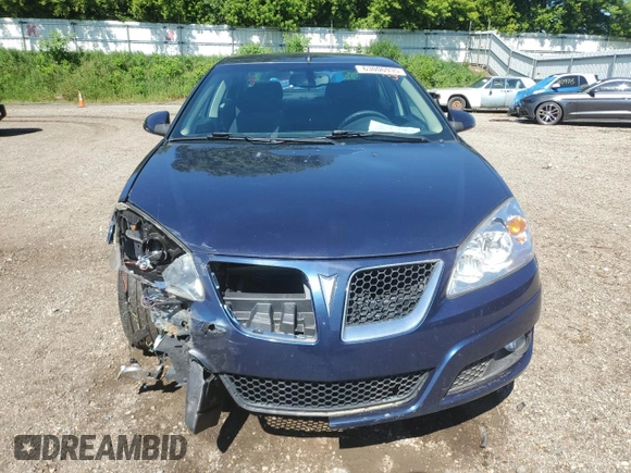 2009 Pontiac G6 1SB with VIN 1G2ZJ57K694272894, listed as a Copart auction lot 63006935 with 125,640 mi miles and Clean title. Bid and sale history available at DreamBid. Image 5.