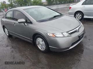 2007 Honda Civic z VIN JHMFA36207S026273, wystawiony jako IAAI lot #42258238 z przebiegiem 128 911 mil mil oraz . Historia ofert i sprzedaży dostępna na DreamBid. Obrazek 1.