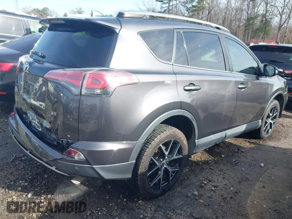 2017 Toyota RAV4 SE with VIN 2T3NFREV3HW334656, listed as a IAAI auction lot 41311703 with 153,337 mi miles and . Bid and sale history available at DreamBid. Image 4.