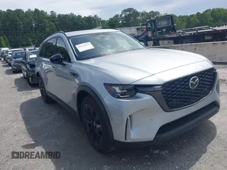 2025 Mazda CX-90 Premium Sport with VIN JM3KKCHDXS1222383, listed as a IAAI auction lot 42535826 with 9,786 mi miles and . Bid and sale history available at DreamBid. Image 1.
