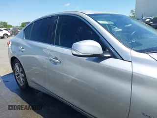 2017 Infiniti Q50 Premium z VIN JN1EV7AP3HM734389, wystawiony jako IAAI lot #42037510 z przebiegiem 125 130 mil mil oraz . Historia ofert i sprzedaży dostępna na DreamBid. Obrazek 13.