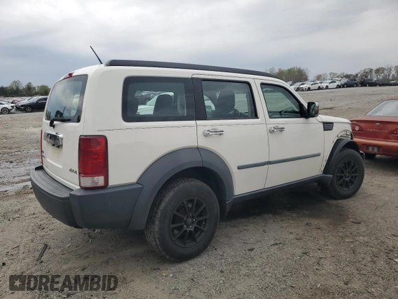 2008 Dodge Nitro SXT with VIN 1D8GU28K08W285099, listed as a Copart auction lot 52709275 with 123,048 mi miles and Salvage Title. Bid and sale history available at DreamBid. Image 3.