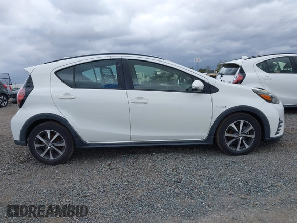 2018 Toyota Prius One with VIN JTDKDTB35J1615449, listed as a IAAI auction lot 42041928 with 59,870 mi miles and . Bid and sale history available at DreamBid. Image 13.