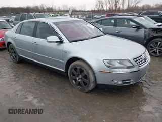 2005 Volkswagen Phaeton z VIN WVWBH03D858004483, wystawiony jako IAAI lot #41412475 z przebiegiem 146 072 mil mil oraz . Historia ofert i sprzedaży dostępna na DreamBid. Obrazek 1.