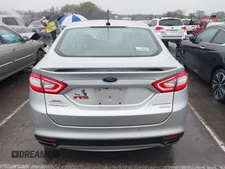 2016 Ford Fusion Titanium with VIN 3FA6P0K91GR360914, listed as a IAAI auction lot 41833665 with 107,367 mi miles and . Bid and sale history available at DreamBid. Image 16.