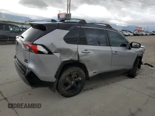 2021 Toyota RAV4 Hybrid XSE with VIN 4T3E6RFV2MU016441, listed as a Copart auction lot 57090975 with 69,304 mi miles and Salvage title. Bid and sale history available at DreamBid. Image 3.