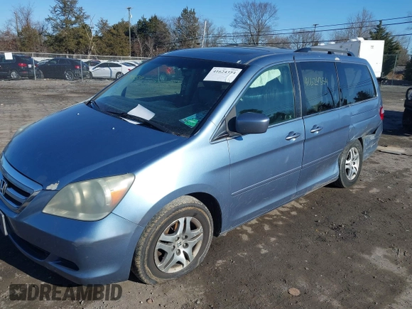 2005 Honda Odyssey EX-L with VIN 5FNRL38765B076591, listed as a IAAI auction lot 41624354 with 172,698 mi miles and . Bid and sale history available at DreamBid. Image 16.