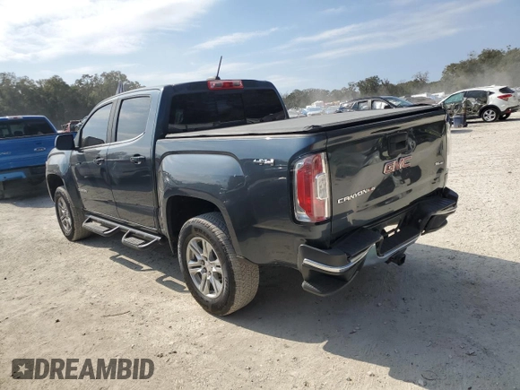 2019 GMC Canyon 4WD SLE with VIN 1GTG6CEN1K1129624, listed as a Copart auction lot 44106575 with 106,734 mi miles and Salvage Title. Bid and sale history available at carsss.com. Image 2.