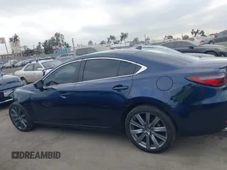 2018 Mazda 6 Grand Touring with VIN JM1GL1TY3J1334600, listed as a IAAI auction lot 41060893 with 64,852 mi miles and . Bid and sale history available at DreamBid. Image 15.