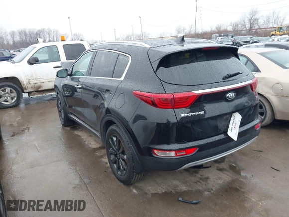 2018 Kia Sportage EX with VIN KNDPNCAC4J7409914, listed as a IAAI auction lot 41654833 with 142,057 mi miles and . Bid and sale history available at carsss.com. Image 3.