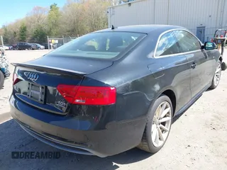 2016 Audi A5 Premium Plus z VIN WAUM2AFR5GA011293, wystawiony jako IAAI lot #41990091 z przebiegiem 131 353 mil mil oraz . Historia ofert i sprzedaży dostępna na DreamBid. Obrazek 4.