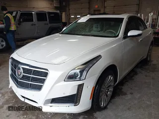 2014 Cadillac CTS Luxury AWD with VIN 1G6AX5S30E0181597, listed as a IAAI auction lot 41853975 with Not Provided miles and . Bid and sale history available at DreamBid. Image 2.