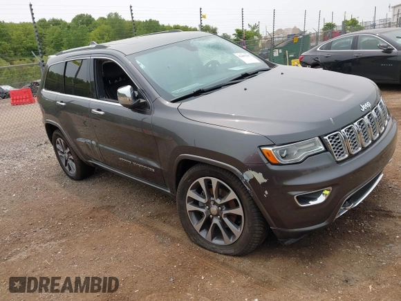 2017 Jeep Grand Cherokee Overland with VIN 1C4RJFCG6HC964435, listed as a IAAI auction lot 42407567 with 113,760 mi miles and . Bid and sale history available at DreamBid. Image 1.